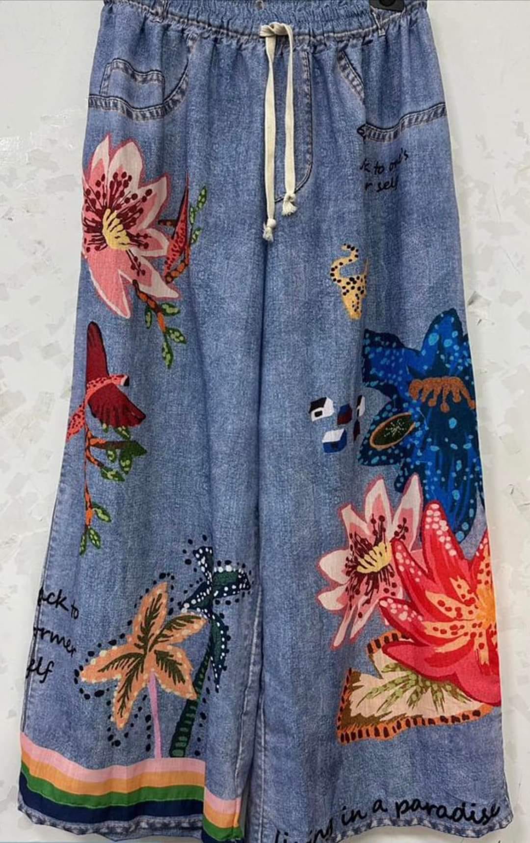 Śliczne niebieskie spodnie jeans imitacja Zetta otto w kolorowe printy. - Italia zdjęcie 3