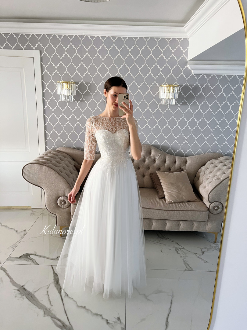 Olivia - tulle wedding dress with 3/4 sleeves and richly decorated top - Kulunove image 4