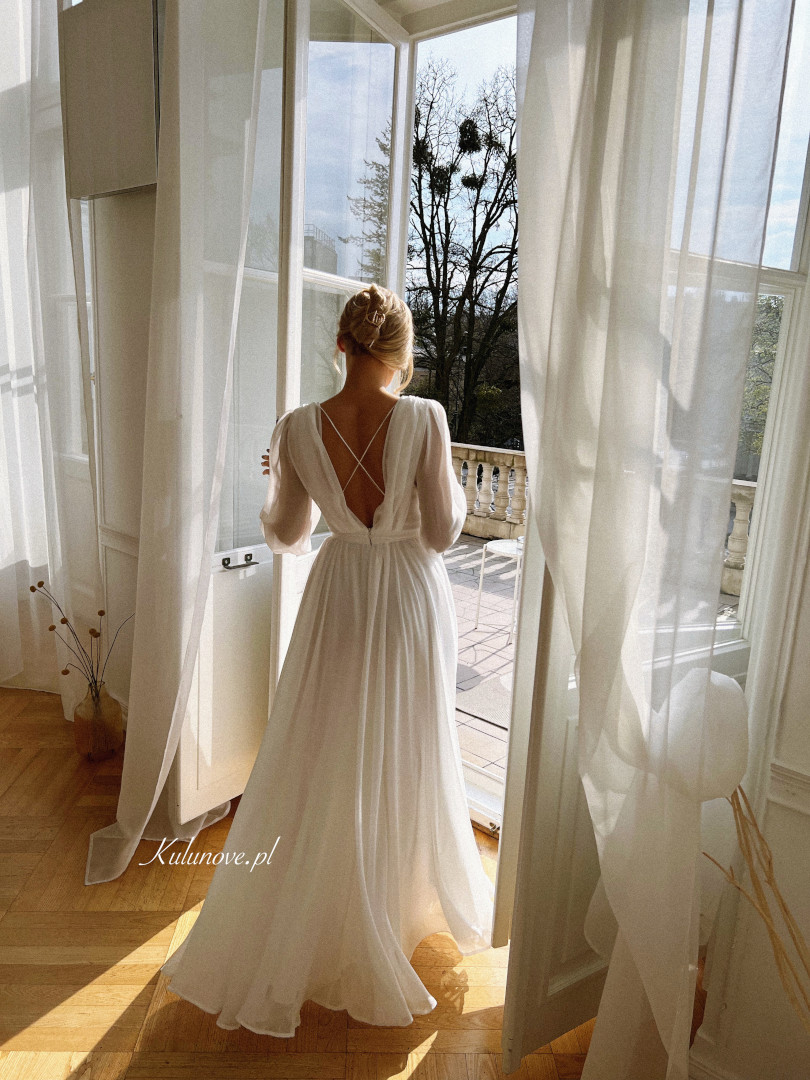Alexandra - a minimalist wedding dress with a built-in front and an open back decorated with straps - Kulunove image 1