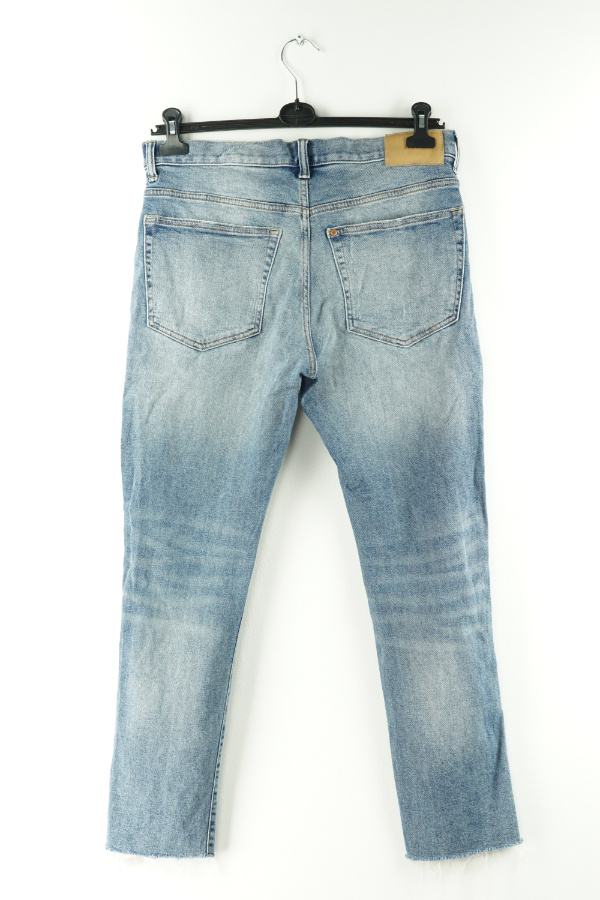 Spodnie niebieskie jeansowe przecierane z dziurą - H&M zdjęcie 2