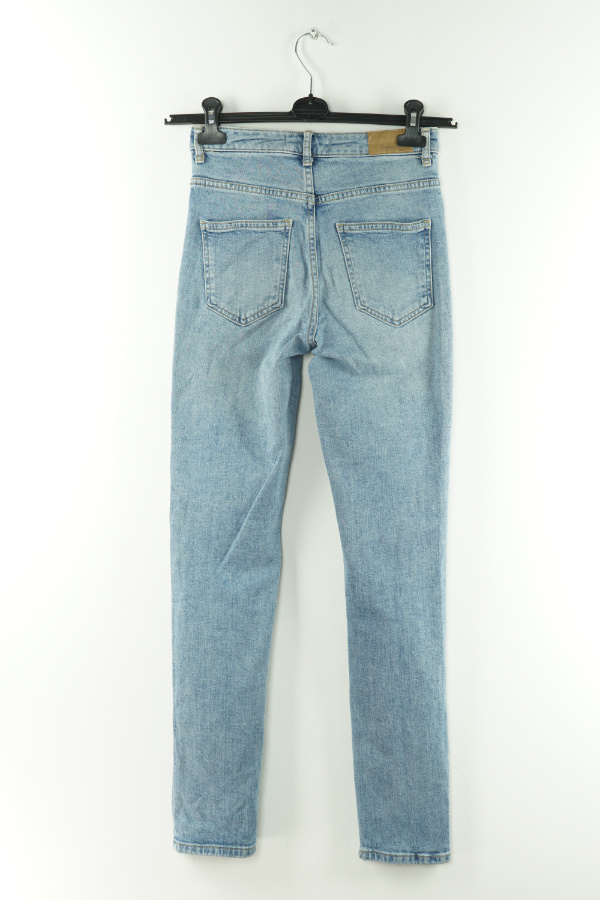 Spodnie niebieskie dziury jeansowe - GINA TRICOT zdjęcie 2