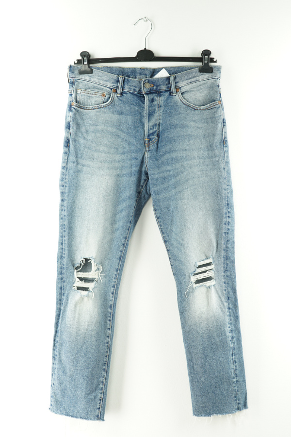 Spodnie niebieskie jeansowe przecierane z dziurą - H&M zdjęcie 1