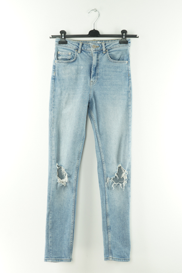 Spodnie niebieskie dziury jeansowe - GINA TRICOT zdjęcie 1