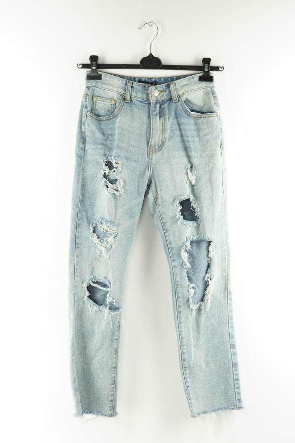 Spodnie jeansowe jasno niebieskie z dziurami - MOMOKROM zdjęcie 1